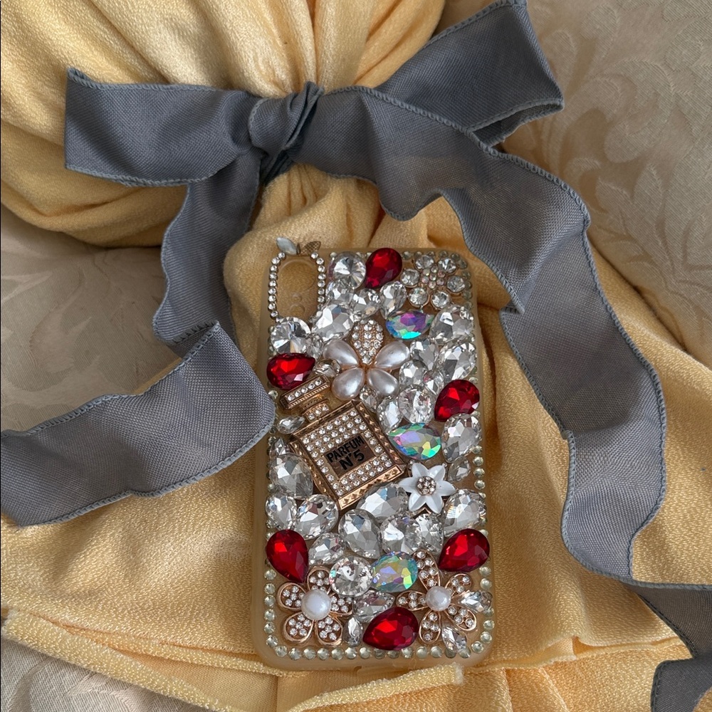 Glamorous Crystal Phone Case with Red and Gold Accents - Picture 3 of 3